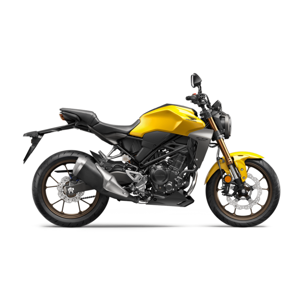 Motocicletta gialla sportiva laterale su sfondo bianco.